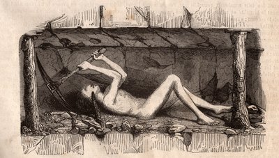 Un giovane, sdraiato a terra e che raccoglie il soffitto del tunnel in una miniera di carbone inglese da Unknown